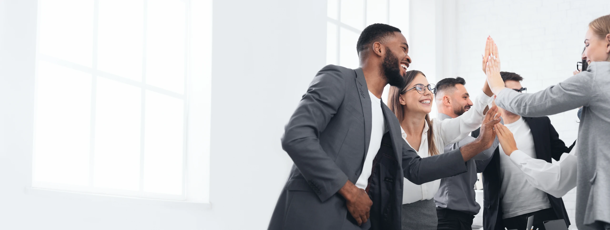 Diverse team of professionals collaborating in a modern office